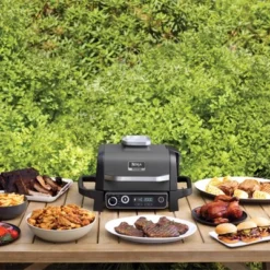 Ninja Woodfire Outdoor Grill & Smoker, 7-in-1 Master Grill, BBQ Smoker And Air Fryer With Woodfire Technology - OG701 -Garden & Outdoors GUEST ec15f11e 3649 4325 9fe8 f8e21818e708